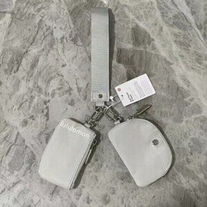 Brand new with tags Lululemon dual pouch keychain